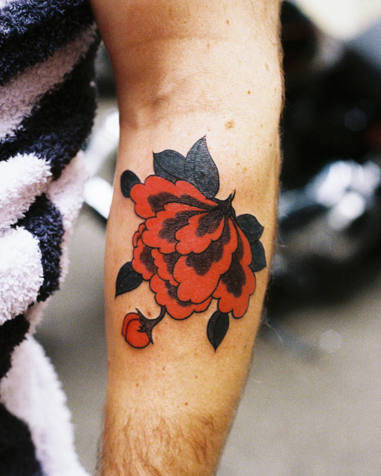 Red peony — forearm — Seongjin Kim, 2025